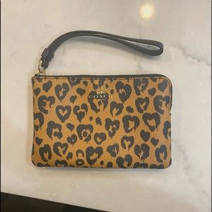 Coach animal print wristlet.